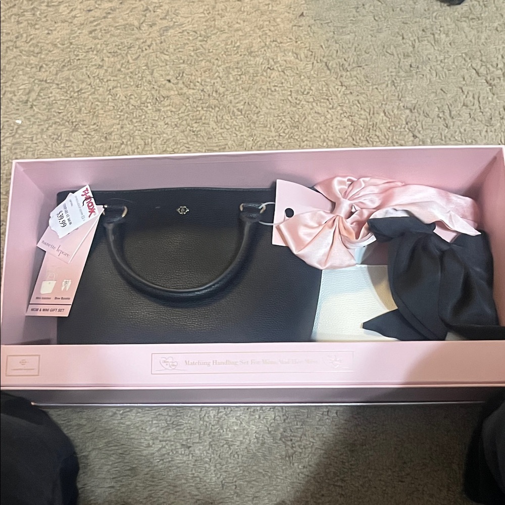 Nanette Lepore Black Satchel with Pink Accents